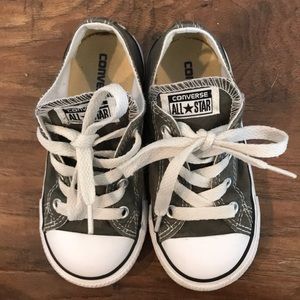 Converse kid shoes.